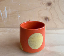 Load image into Gallery viewer, Orange mug with yellow dot
