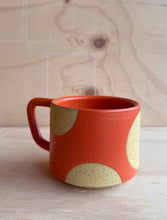 Load image into Gallery viewer, Orange mug with yellow dot
